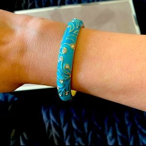 A rare aqua colored enamel bangle bracelet in EUC by Henri Bendel. Stunning!